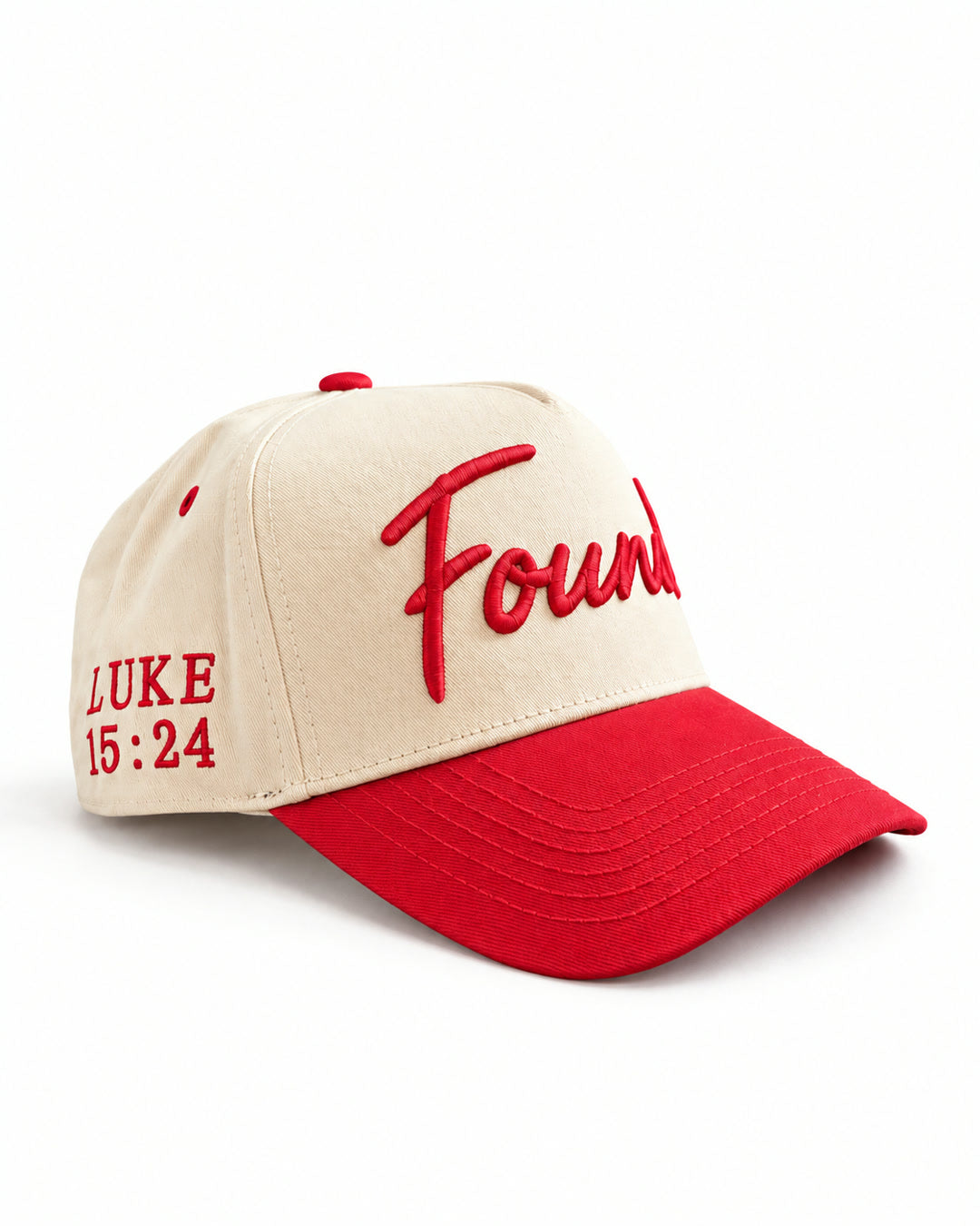 Found Cap in cream with red bill, three-quarter view with LUKE 15:24 on the side